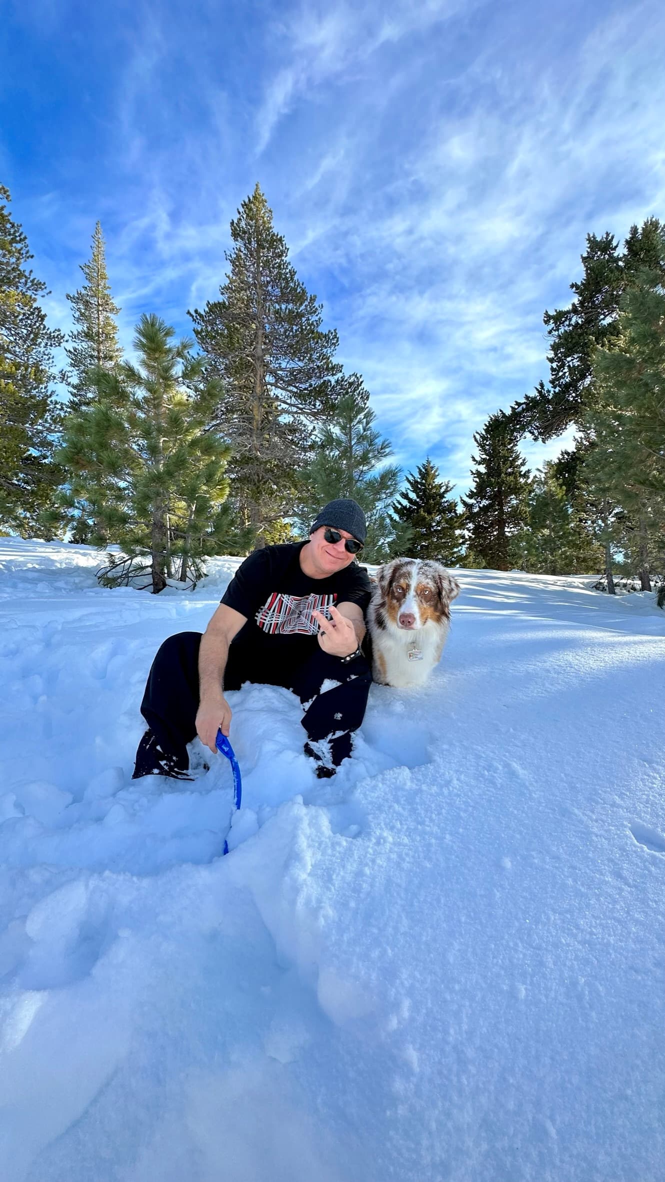Gustavo Girard with his Australian Shepherd in the Sierra Nevada